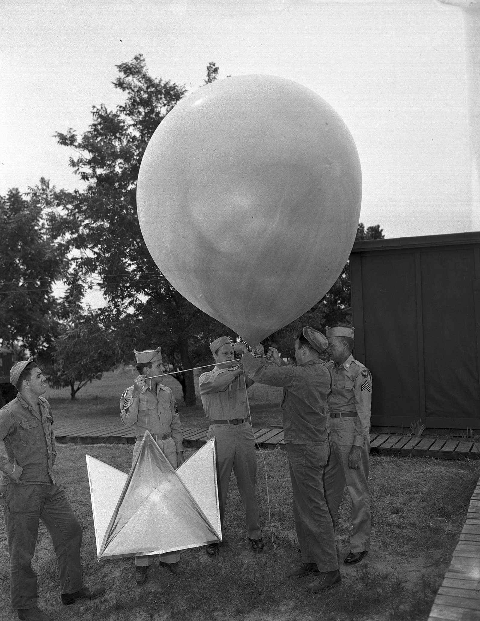The Army's follow-up photo session, July 11, 1947, presenting the debris as the remains of a weather balloon and radar target.