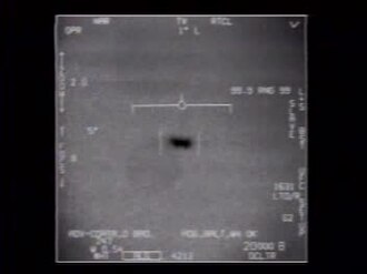 Frame from 'FLIR1,' the official US Navy F/A-18 targeting-pod video of the object encountered off San Diego during the 2004 USS Nimitz carrier strike group exercises — one of three UAP videos the Department of Defense declassified and released in 2020.