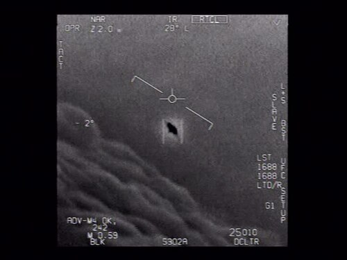 Frame from 'GIMBAL,' the official US Navy targeting-pod video recorded during 2015 training flights linked to the USS Theodore Roosevelt carrier strike group — one of three UAP videos the Department of Defense declassified and released in 2020.
